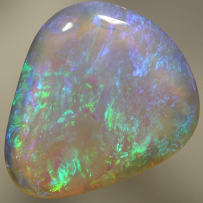 SOLID CRYSTAL OPAL Beautiful green and blues sparkle in a 3D pattern with a hue of purple through out